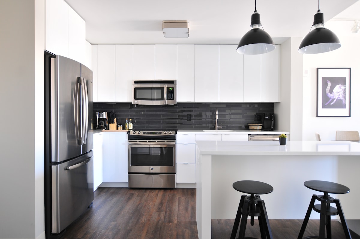 custom counter top, reclaimed kitchen sink, custom cabinet below.